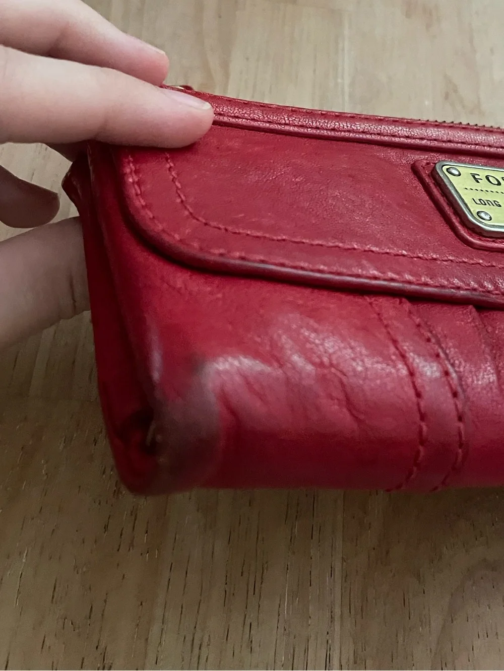 Fossil emory clutch